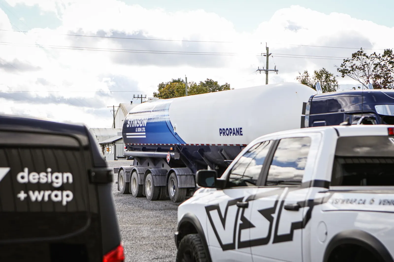 WO Stinson propane trailer and VSF Wrap trucks