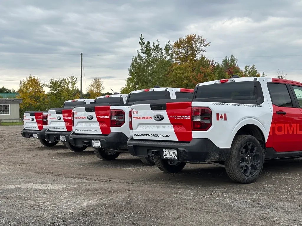 Tomlinson fleet of wrapped Ford Maverick pickups