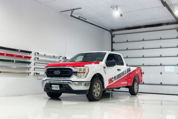 Professional Ford F-150 wrap ABC Plumbing in Ottawa, designed for consistency across multiple vehicles.