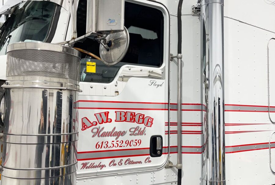 A high-precision striping package wrap for AW Begg in Ottawa, ensuring road safety and brand consistency.