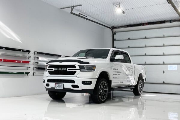 A stylish and well-branded commercial van wrap for Claro Cabinet in Ottawa, designed for high-impact advertising.