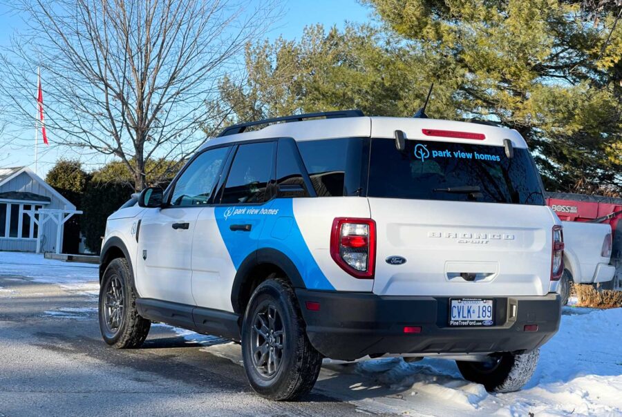 A stylish Ford Bronco Sport wrap in white and blue, custom-designed for Park View Homes in Ottawa.