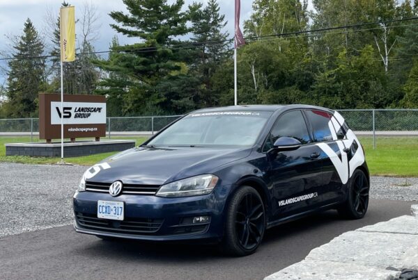 A sleek and professional VW Golf wrap for VS Landscape Group, enhancing business visibility with a custom design by VSF Wrap.